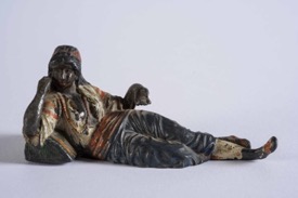 A Cold Painted Bronze Figure of a Sleeping Woman