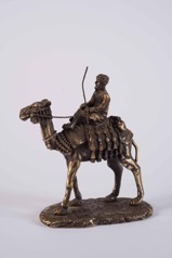 Bronze Statue of an Arab Bedouin Riding Camel
