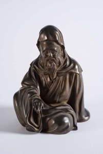 Oriental Bronze Figurine of a Seated Man
