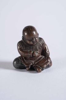Oriental Bronze Figurine of a Seated Child
