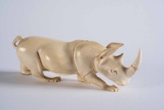 Oriental Carved Ivory Figurine of a Rhinoceros