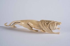 Oriental Carved Ivory Figurine of a Lion