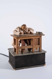 Figurine of a Clockmaker at Work
