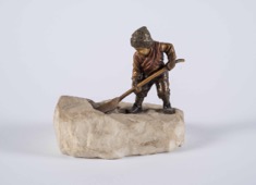 Small Bronze Sculpture of a Child Shoveling Snow on Stone Base